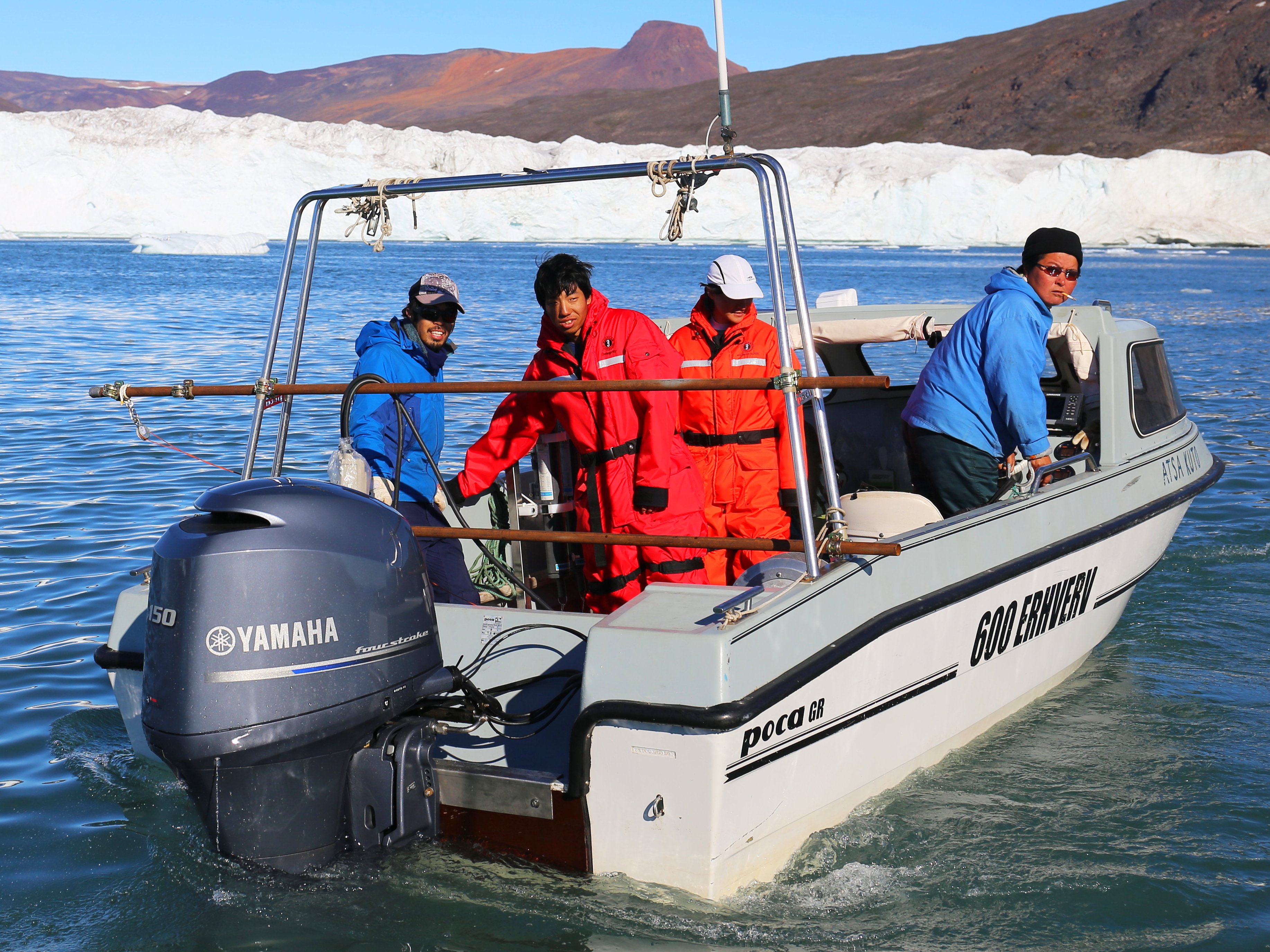 Conducting marine observation in a glacial fjord in collaboration with local residents